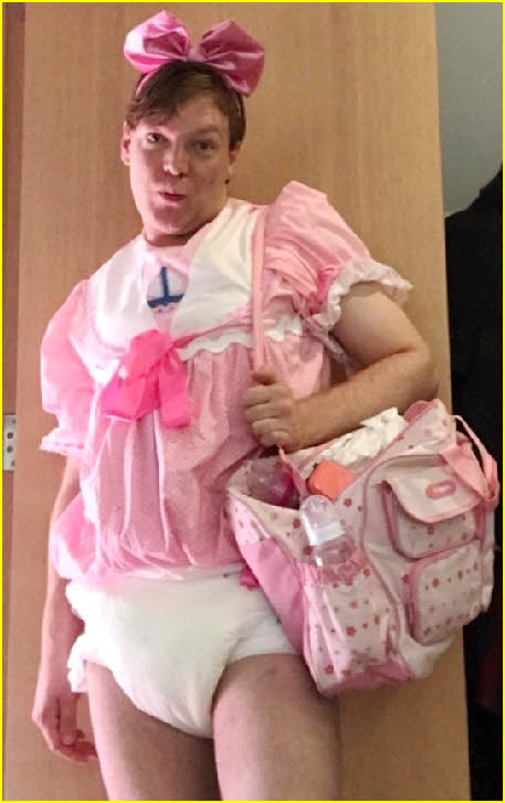 Sissy baby Hugo in pink frock and nappy Sissy baby Hugo in pink frock and nappy