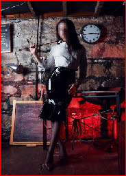 Stunning dominatrix Valentina in white blouse and latex skirt