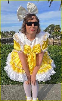 Cute sissy Kim fully emasculated in his frilly yellow frock