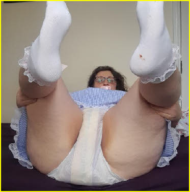 Adult baby girl Emily shows off her padded diapers Adult baby girl Emily shows off her padded diapers