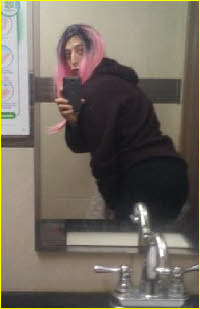 Sissy Sasha takes selfie in gentlemen's toilets