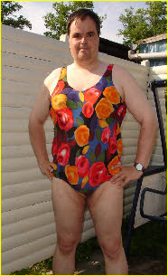 German faggot Holger posing in a floral female swimsuit German faggot Holger posing in a floral female swimsuit