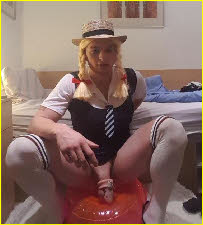 Sissy T-girl in schioolgirl uniform