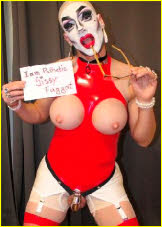 Sissy sex doll Maria wearing heavy make-up and peephole latex top