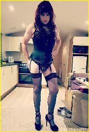 Sissy Jessica rocks black corset and heels