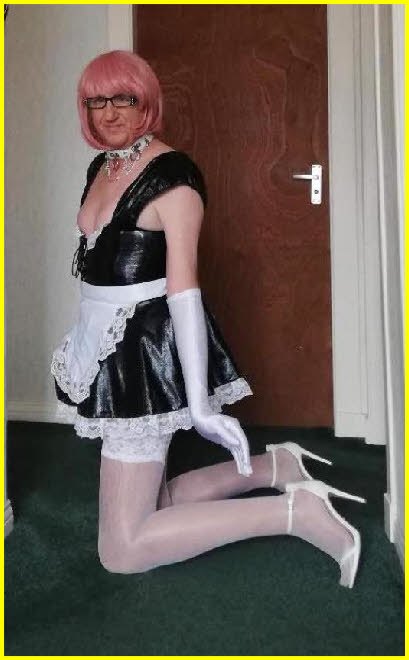 Crossdressing sissy maid down on his knees