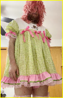Bearded sissy Emily looking pathetic in little girl dress