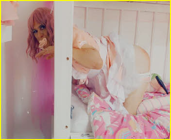 Dummy-sucking sissy baby Tracey with her frilly panties down Dummy-sucking sissy baby Tracey with her frilly panties down