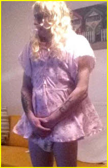 Grown man cross-dressing in little sissy girl frock