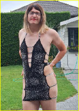 Belgian sissy Natasja wearing a ridiculously slutty dress