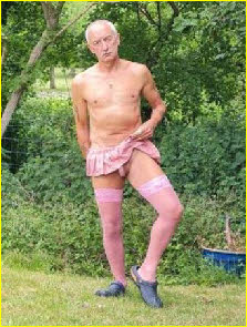 Limp-dicked faggot Andy Marks exposed in a pink pleated miniskirt