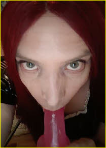 Sissy slut in training practises giving head with a dildo