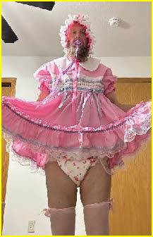 Loser male exposed sucking dummy in pink frilly frock and nappy