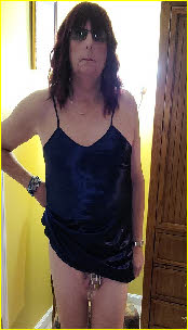 Crossdressing loser male locked in chastity