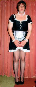 Effeminate sissy maid Vicki dressed to serve