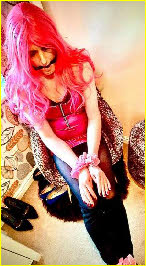 Sissy Tina gagged and with his wrists bound together
