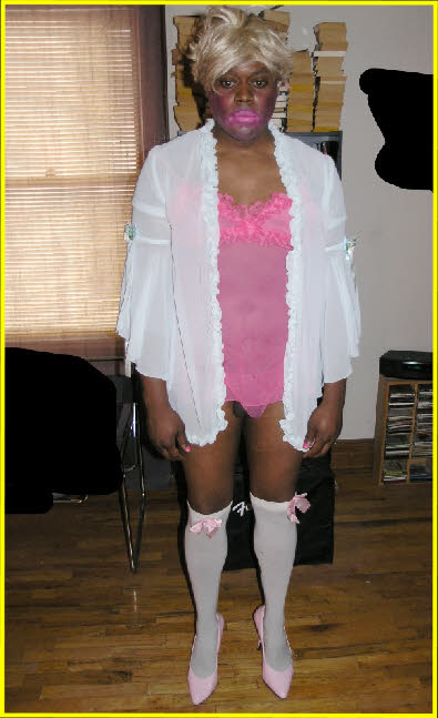 Degraded black sissy in ridiculous pink nightie