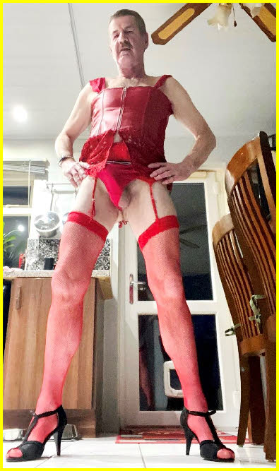 Married sissy Simone in slutty red lingerie and stockings