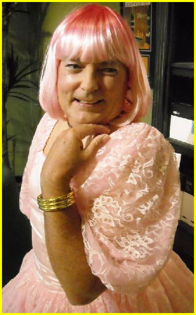 Mincing sissy Michael from Arizona exposed in pink frock