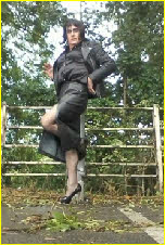Sissy slut dogging in leather coat and dress