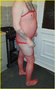 Sissy slut in red fishnets