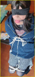 Crossdresser Lory blindfolded, gagged and bound