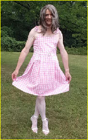 Closet sissy Julie from Newbury mincing around in a tragic pink frock