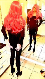 Sissy Tina checks out his full transvestite transformation in the mirror