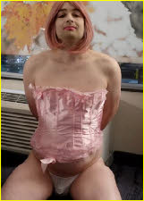 Chastity slut Diana exposed in a slutty pink corset and cock cage