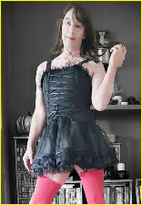 Closet sissy Paula exposed in little black dress and pink stockings