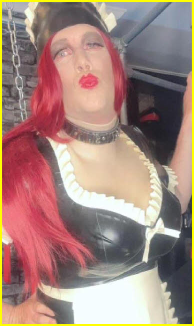 Submissive sissy Natalie in latex maid uniform